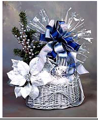 Picture of silver holiday gift basket filled with sweet and savory items.