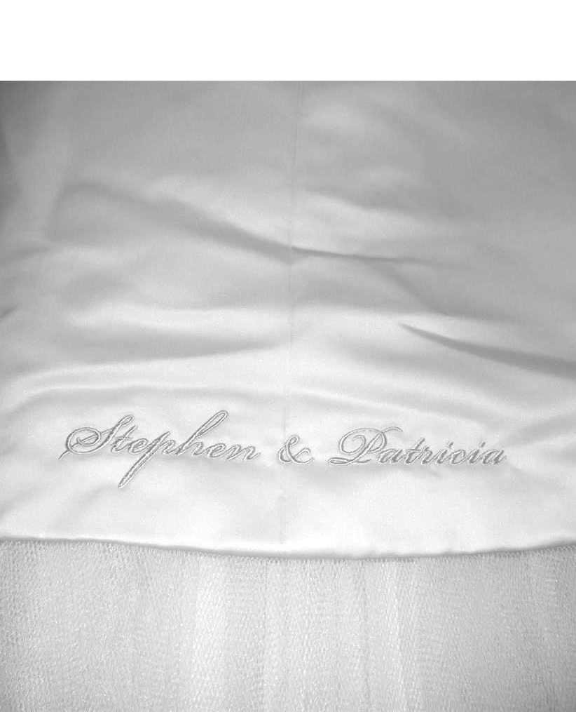 Bride and groom's names on bottom of dress