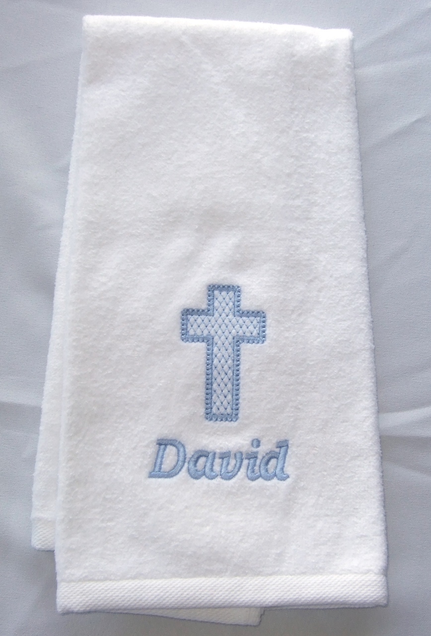 Baptismal towel with blue light fill cross and baby's name