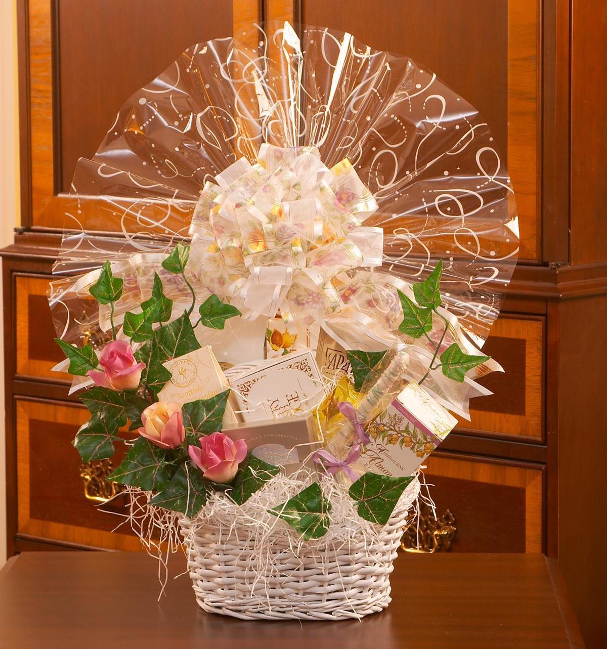 Wedding gift basket featuring delicious sweets and treats.